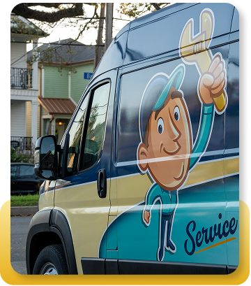 a work van with a mascot on the side in front of a neighborhood